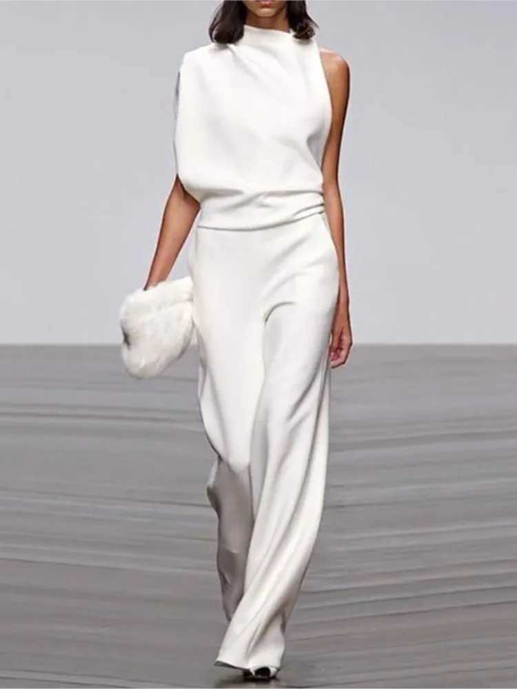 Solid color irregular Sveless jumpsuit womens fashionable temperature sexy backless foldable Slightly Flared jumpsuit women 2024 X250318