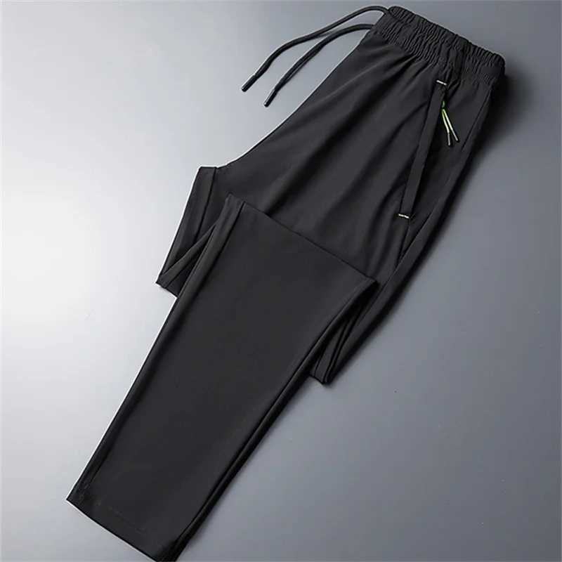 Plus Size 8XL 7XL 6XL Mens Sports Pants Quick Drying Mens Trouser Jogger Sports Clothes Solid Sports Pants Mens Elastic Sports Pants W250318