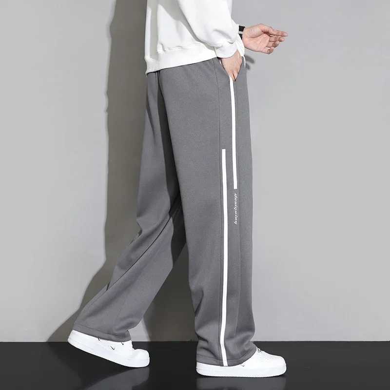 2024 New Sportswear Mens Pocket Jogger Wide Leg Jogging Pants Neutral Breathable Loose Outdoor Sportswear Fashion Design Jogging Pants W250318