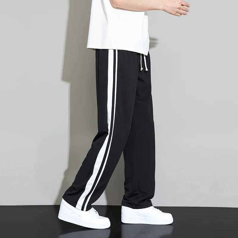 Summer new mens sports pants jogging pants straight pants neutral breathable loose outdoor fast drying fabric striped casual Trouser W250318