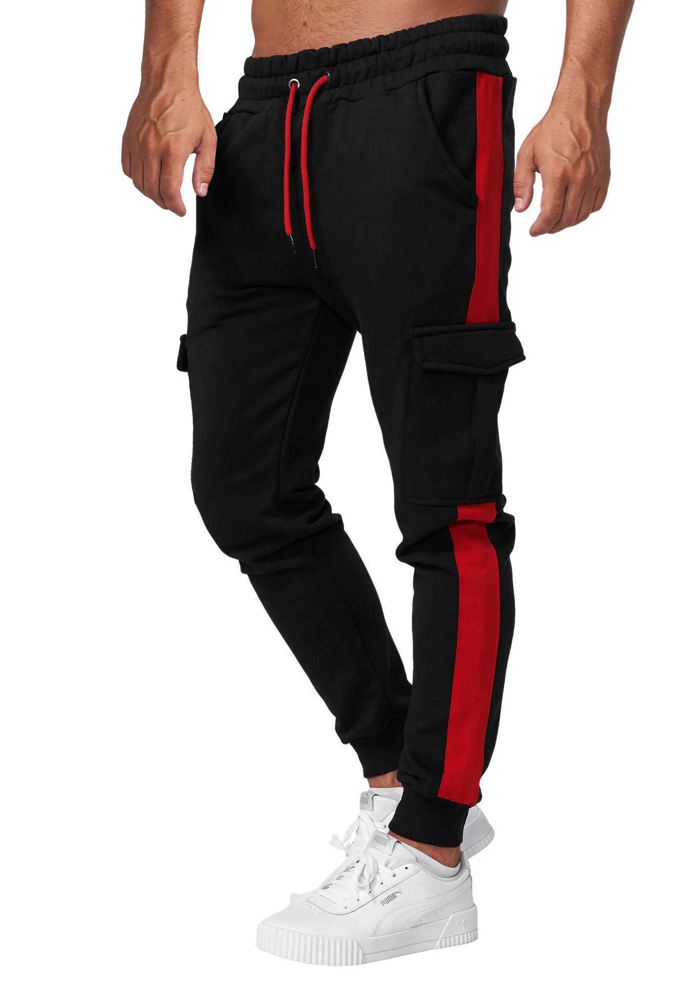 New winter sportswear mens plush sports pants Lambswool hot pants casual pants windproof and warm cotton pants W250318