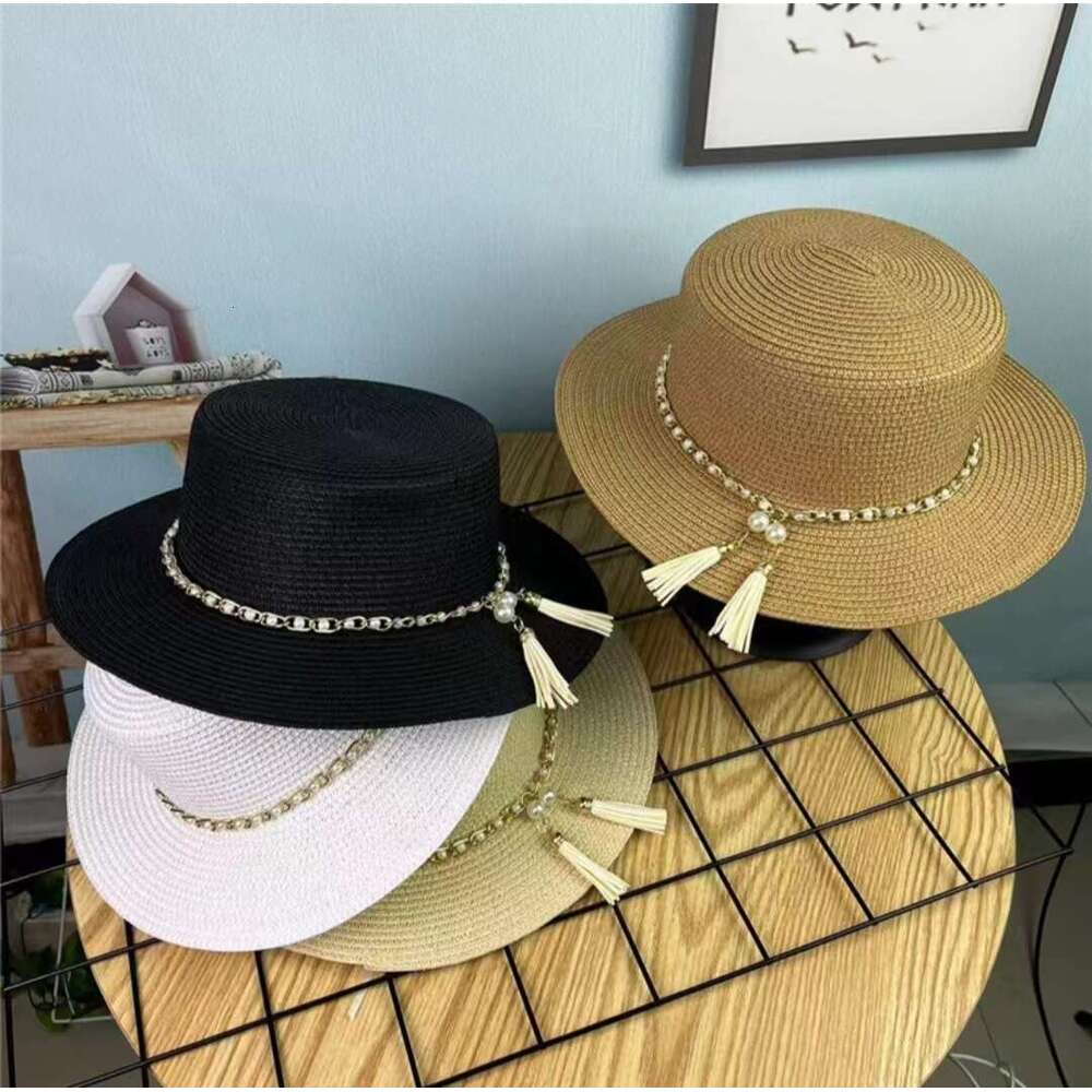 Summer flat topped straw hat with pearl chain, women's British top travel Korean version beach sun hat, trendy