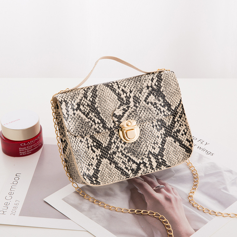 Fashion Designer Women s Mini Handbag Avant garde Snake Pattern Single Shoulder Chain Crossbody Bag 2025 New Metal Buckle Casual Crossbody Bag Wallet 