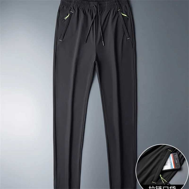 Plus Size 8XL 7XL 6XL Mens Sports Pants Quick Drying Mens Trouser Jogger Sports Clothes Solid Sports Pants Mens Elastic Sports Pants W250318