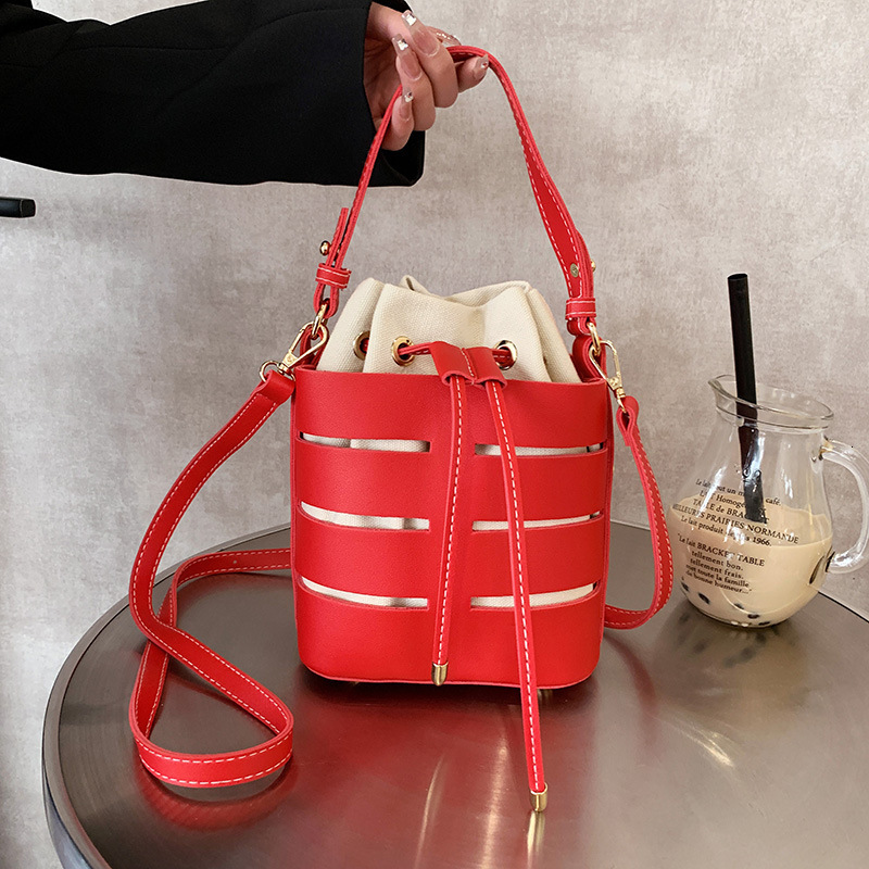 2025 New Fashion Designer Women s Handbag Multi Color Hollow Bucket Bag High Quality Popular Crossbody Bag Trendy Large Capacity Single Shoulder Walle