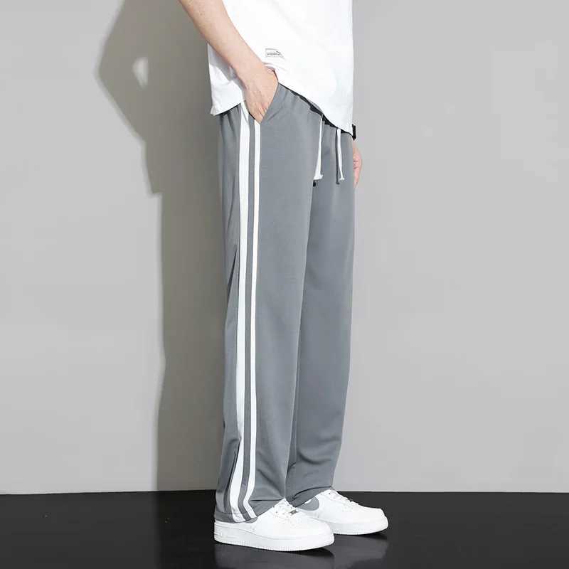 Summer new mens sports pants jogging pants straight pants neutral breathable loose outdoor fast drying fabric striped casual Trouser W250318