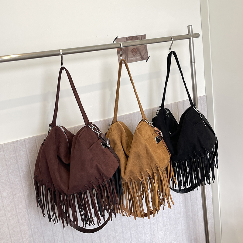 2025 New Korean Fashion Tassel Shoulder Multi Functional Trendy Designer Crossbody Bag Off Road Large Capacity Motorcycle Square Bag Storage Bag Handb