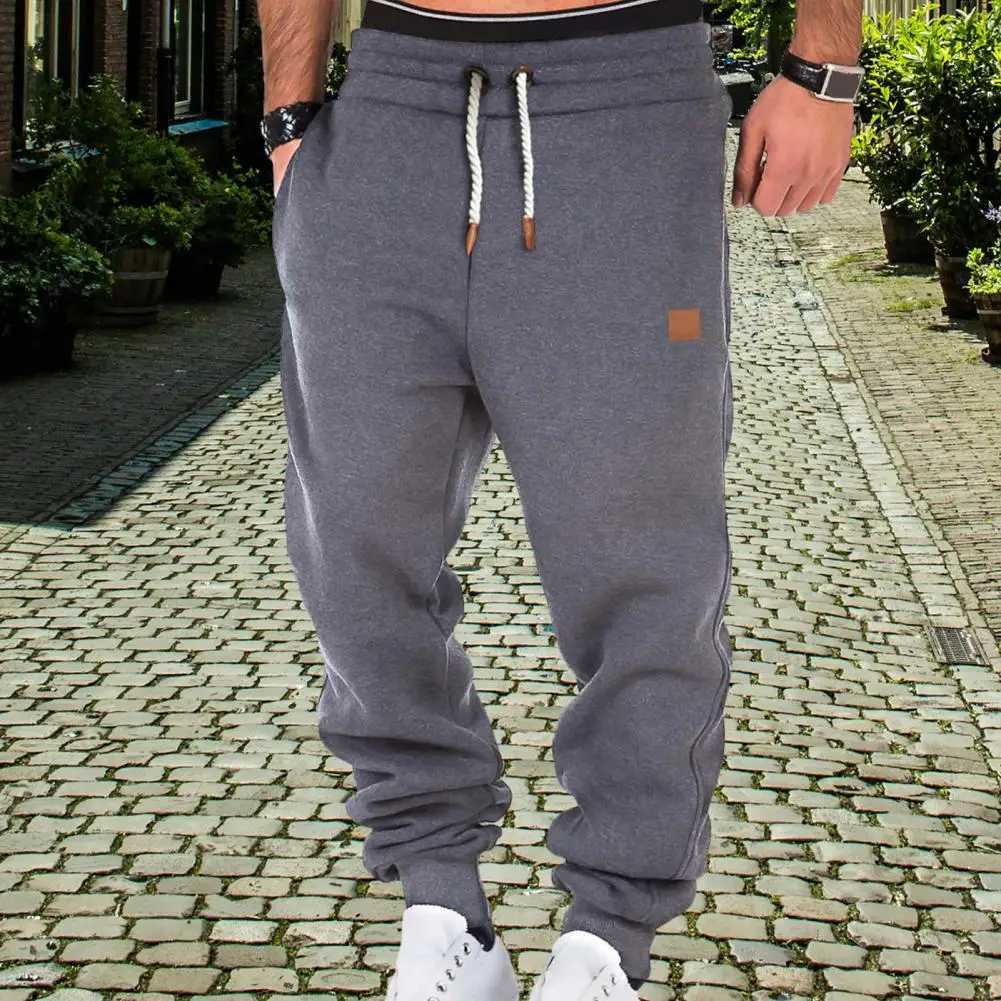 Mens sports leggings with elastic waist and pockets soft and breathable jogging leggings W250318