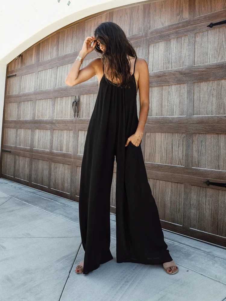 Loose wide leg American jumpsuit womens pendant summer new pocket pants casual pants womens solid straight seaside clothing X250318