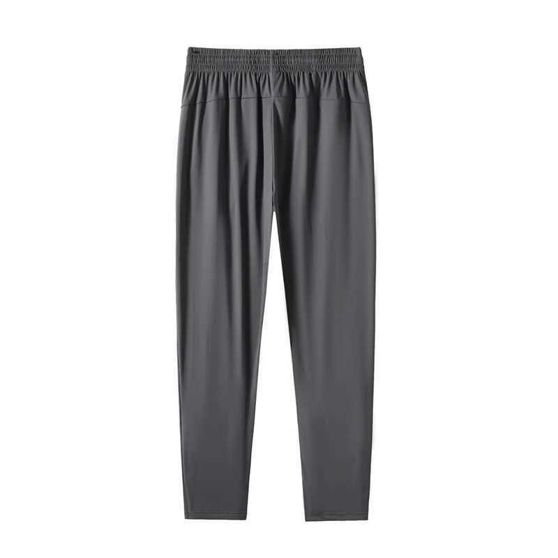 Mens ice silk pants summer thin quick drying breathable sports pants loose size straight leg elastic fashionable casual pants W250318