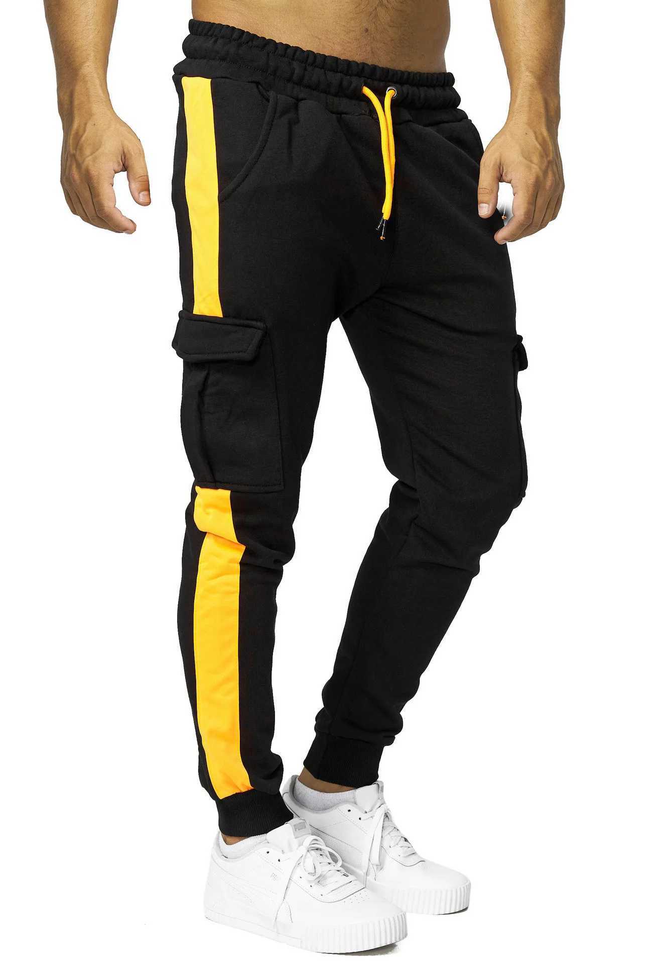 New winter sportswear mens plush sports pants Lambswool hot pants casual pants windproof and warm cotton pants W250318