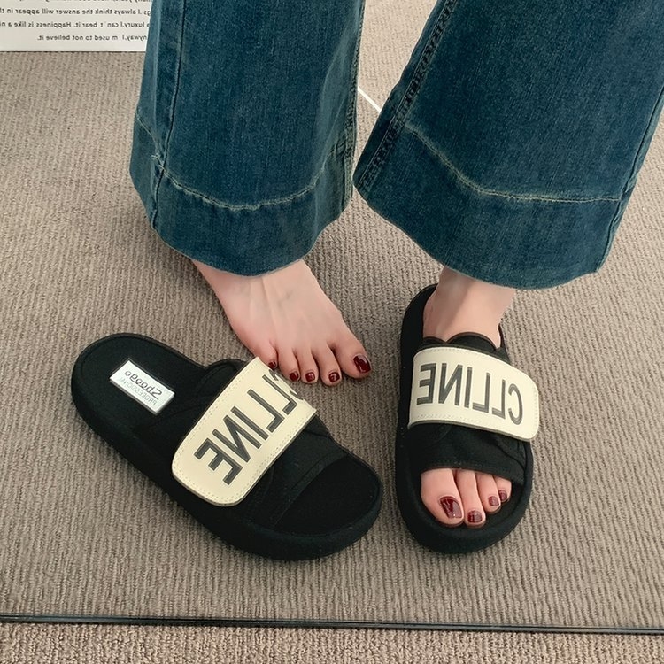 Korean version women's thick-soled one-word slippers new summer 2025 style soft sole with a feeling like stepping on poop non-slip beach sandals
