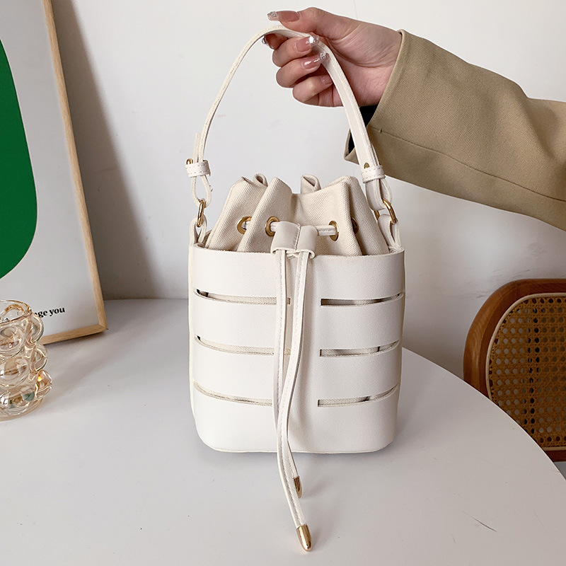 2025 New Fashion Designer Women s Handbag Multi Color Hollow Bucket Bag High Quality Popular Crossbody Bag Trendy Large Capacity Single Shoulder Walle