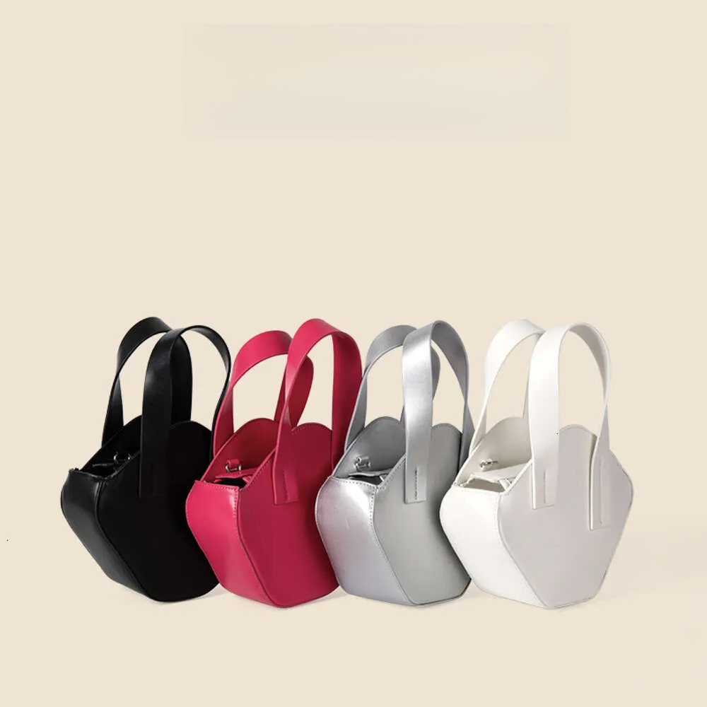 Fashion Designer Mini Handbag Niche Slanted Irregular Diameter Bag Trend Versatile High end Lightweight Handbag 2025 Summer New Item
