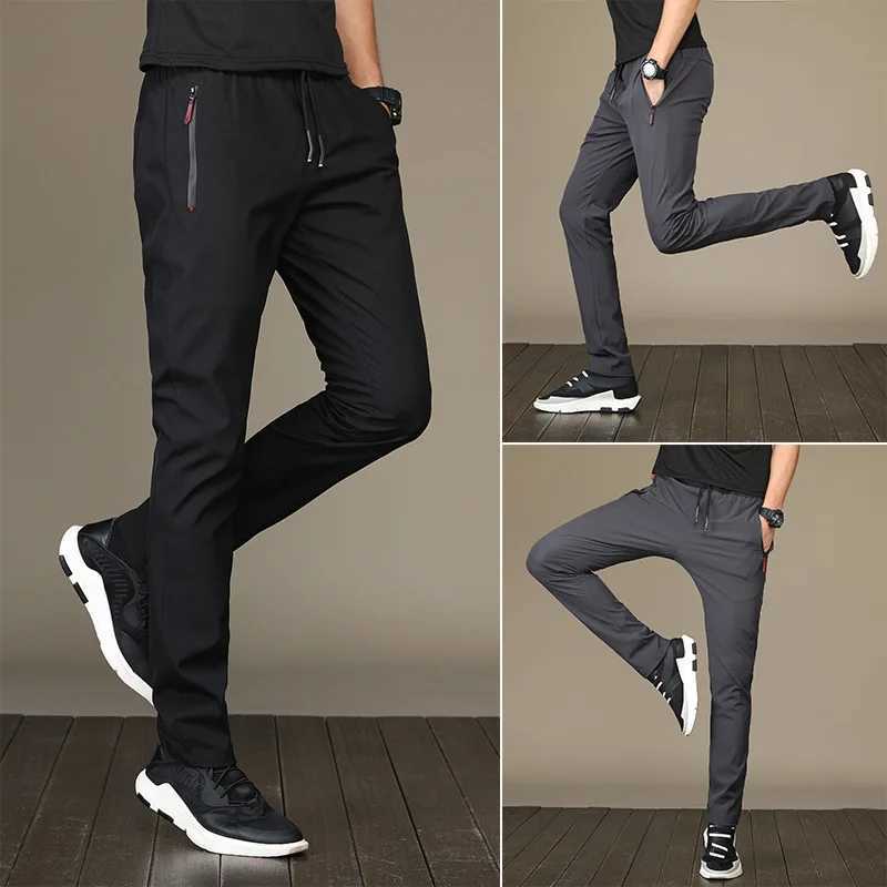 Summer mens ice silk quick drying casual pants slim and suitable for Korean version ice silk sports pants straight tube quick drying W250318