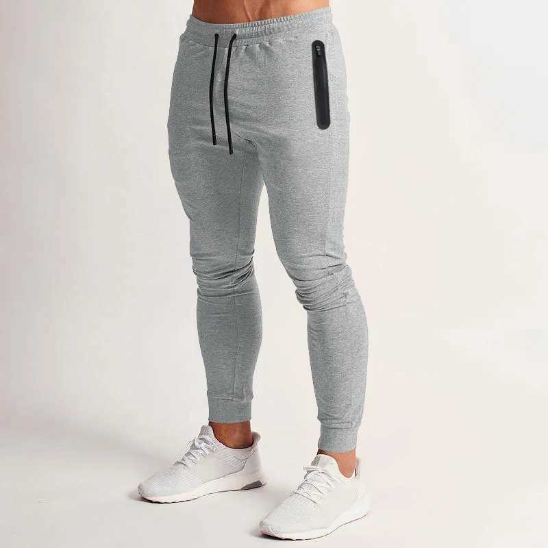 European and American spring and summer new solid color lightweight fitness pants casual elastic sports pants mens fashion trend W250318