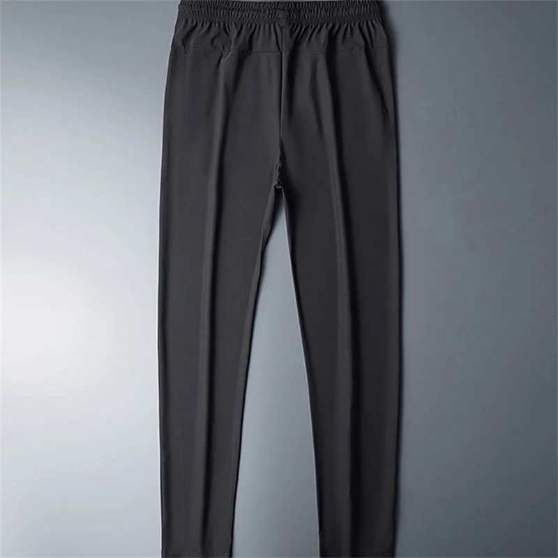 Plus Size 8XL 7XL 6XL Mens Sports Pants Quick Drying Mens Trouser Jogger Sports Clothes Solid Sports Pants Mens Elastic Sports Pants W250318