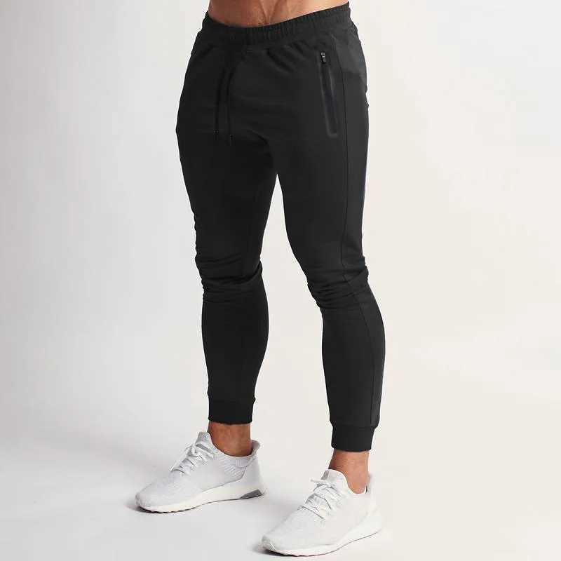European and American spring and summer new solid color lightweight fitness pants casual elastic sports pants mens fashion trend W250318