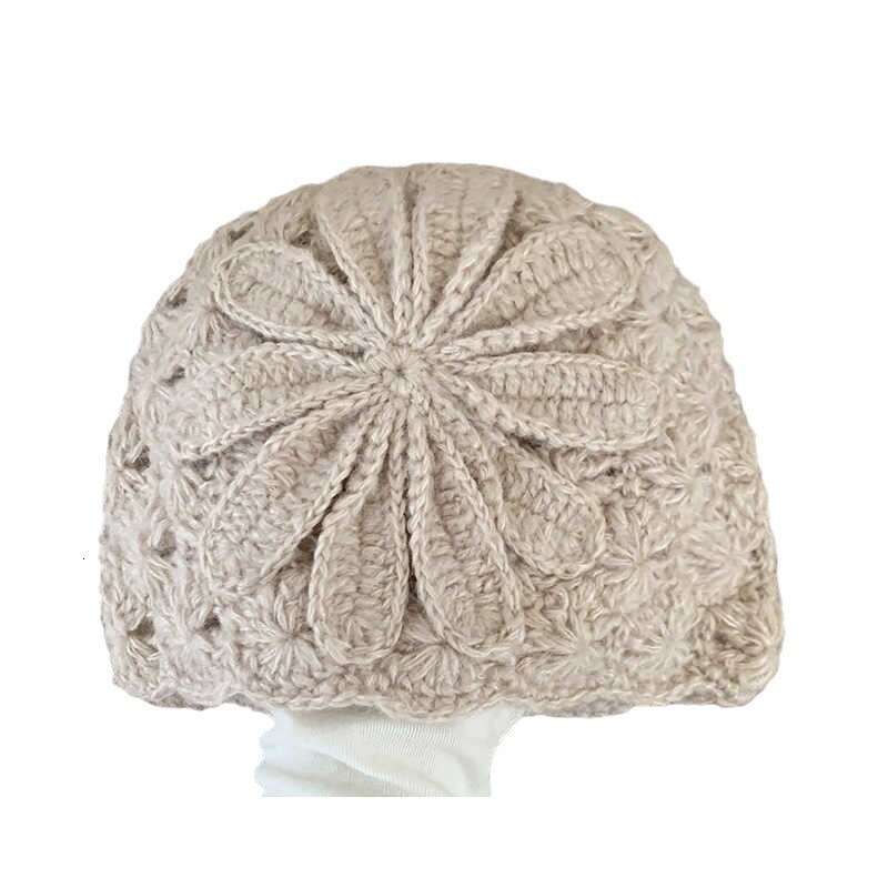 Small niche design handmade crochet yarn for women in spring and autumn, double-layer ear protection pile hat, rural air-cooled hat