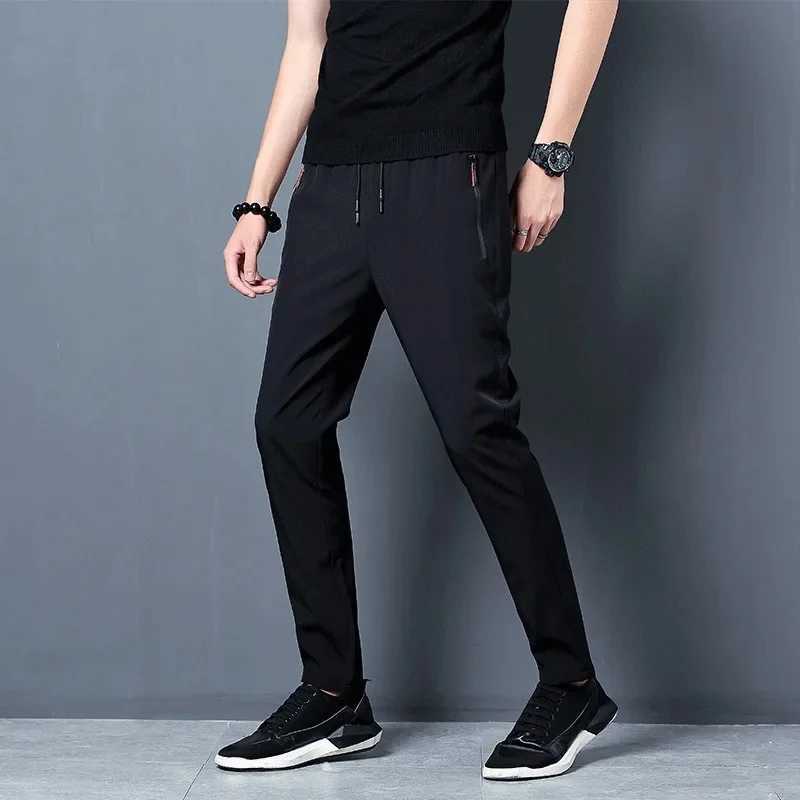 Summer new mens casual pants slim Korean ice silk pants gold round thin sports pants straight tube fast drying jogging pants W250318