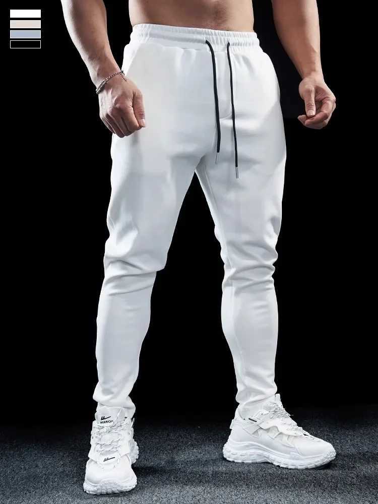Mens sports fitness leisure slim fit elastic running pants top mens quick drying breathable training pants autumn and winter W250318