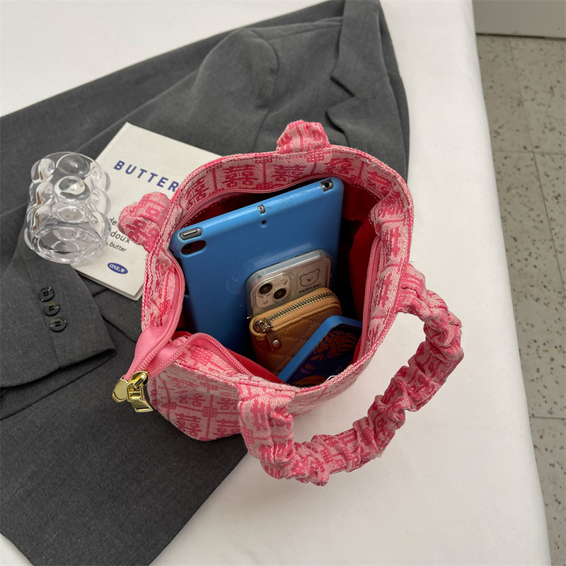 2025 New Women s Designer Original Mini Handbag Handheld Candy Wedding Celebration Bag Leisure Storage Bag Underarm Handbag
