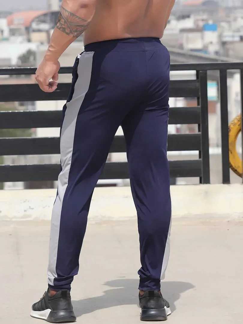 New mens color matching sports pants for running fitness leisure slim feet jogging pants cross-border between Europe and the United States W250318