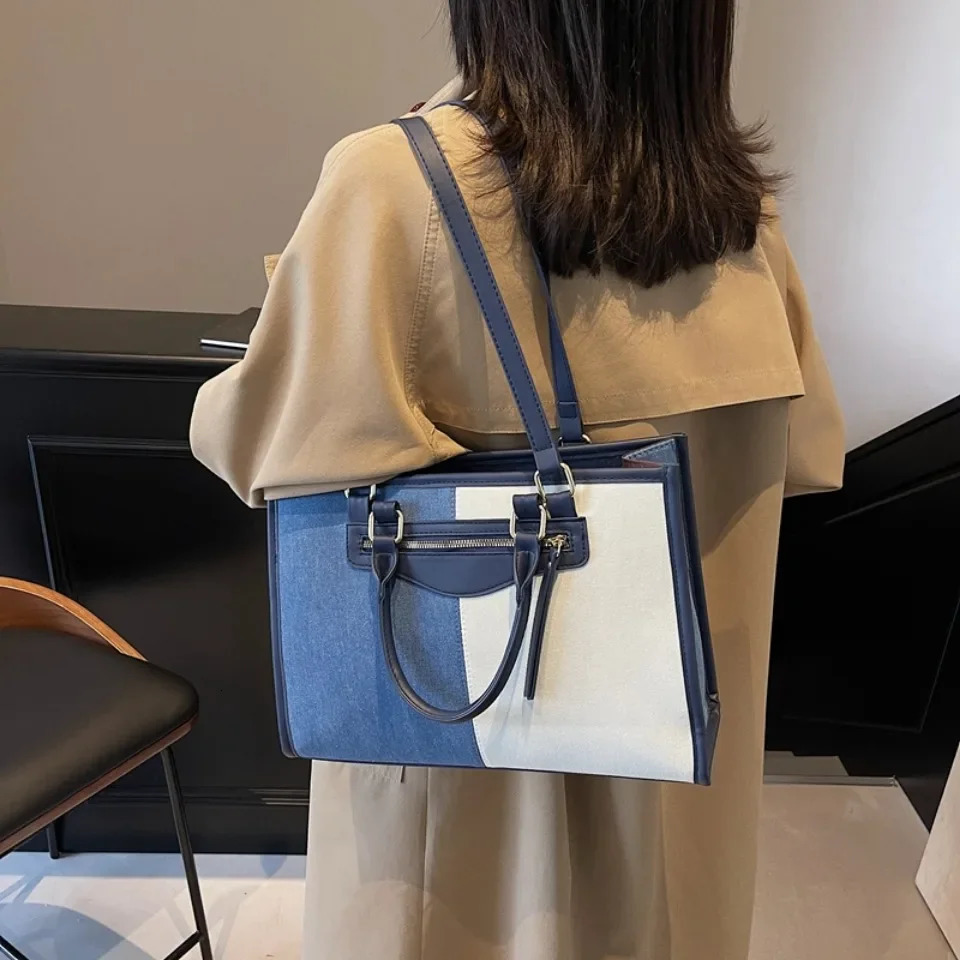 Womens large capacity handbag casual and fashionable womens spliced denim handbag designer luxury shoulder bag womens messenger bag 250317