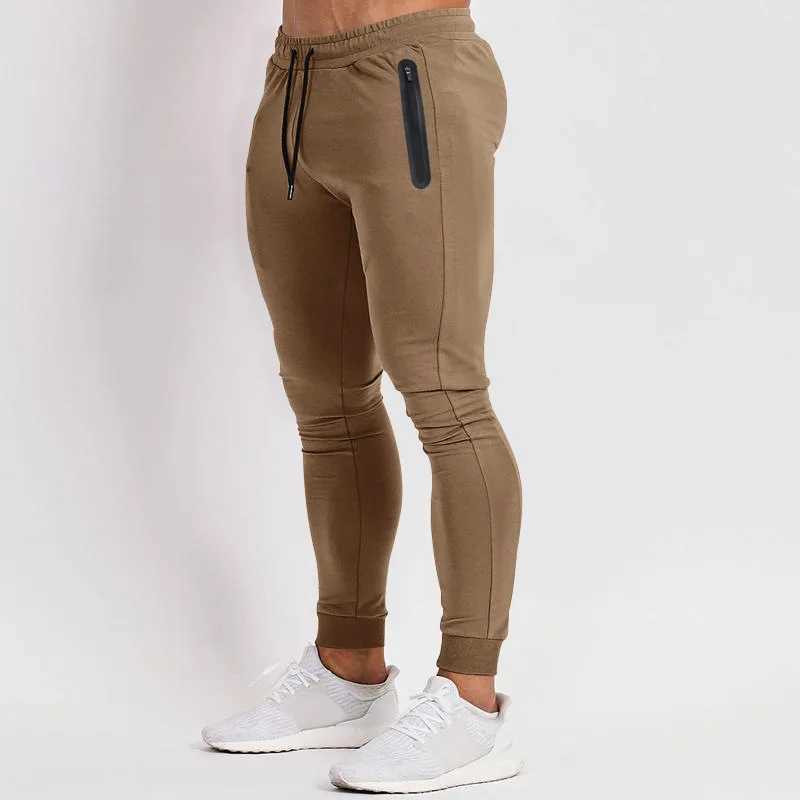 European and American spring and summer new solid color lightweight fitness pants casual elastic sports pants mens fashion trend W250318