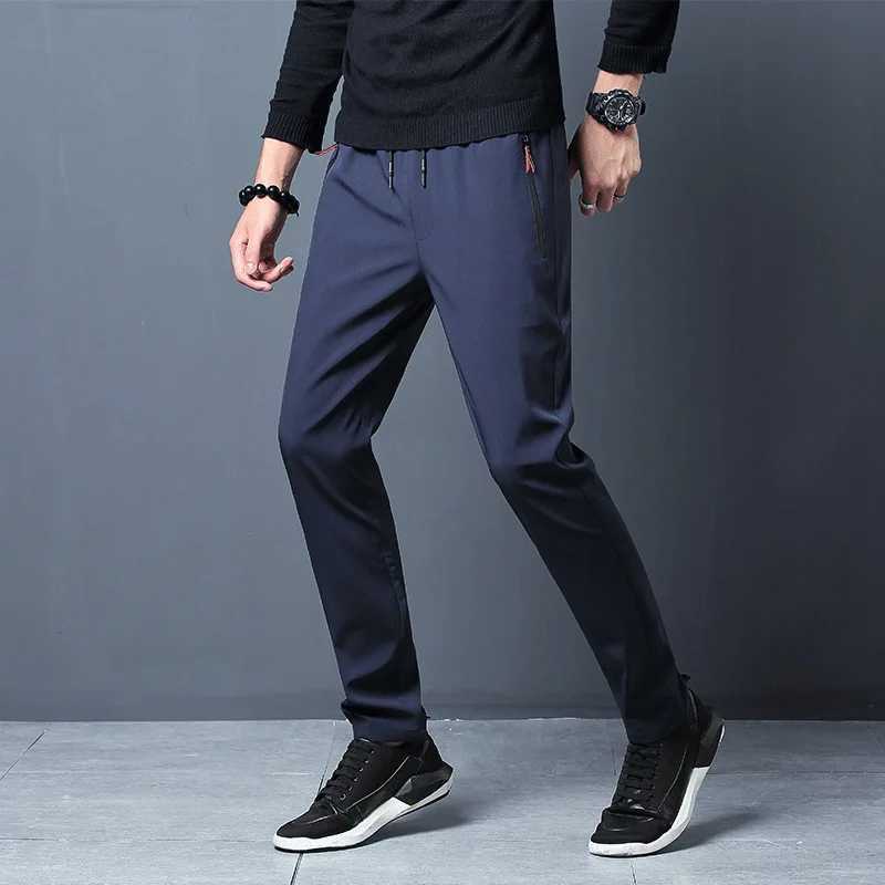 2025 Zipper Pocket Mens Casual Pants Straight Slim Fit Elastic Waist Jogger Korean Classic Blue Black Grey Mens Brand Trouser W250318