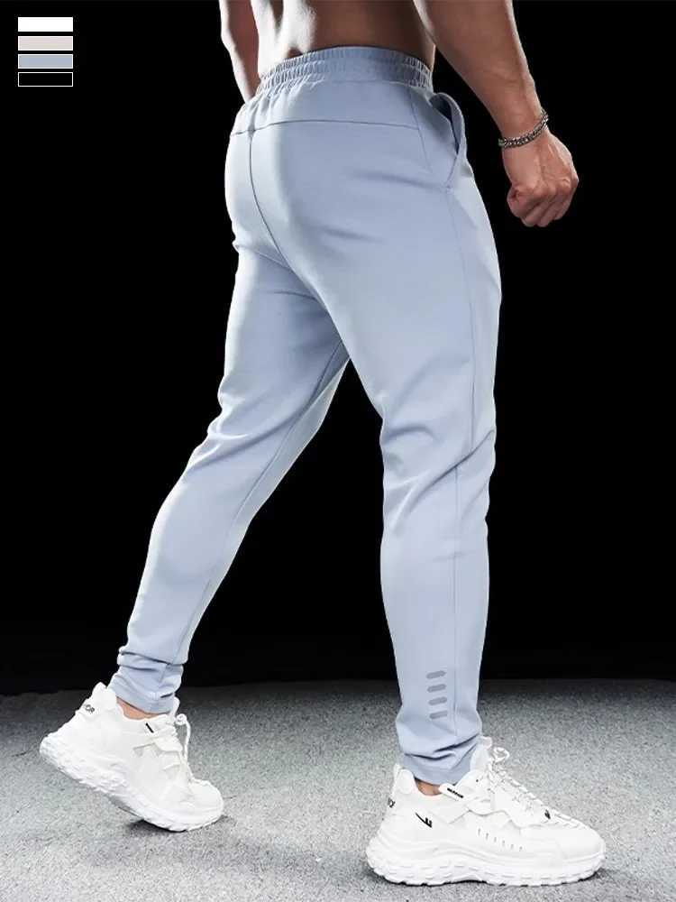Mens sports fitness leisure slim fit elastic running pants top mens quick drying breathable training pants autumn and winter W250318