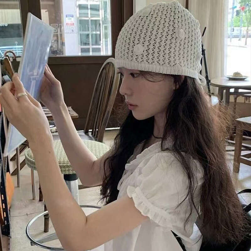 Korean niche design rose hollow knitted hat spring and summer, thin toe for face recognition, small pile cap