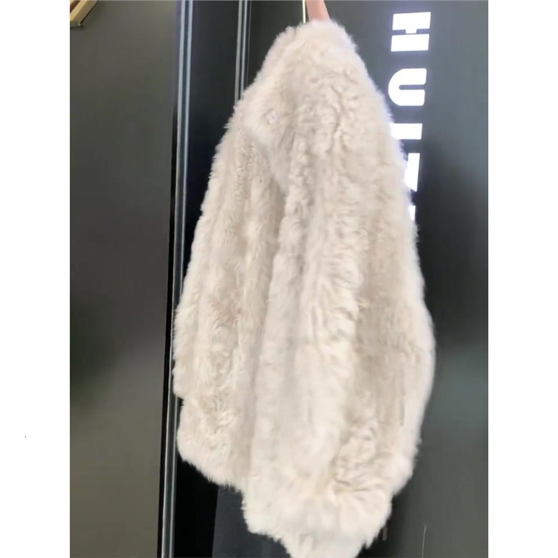 White Xiaoxiang lamb wool coat for women 2024 new style, popular this year, beautiful Korean lazy style niche top