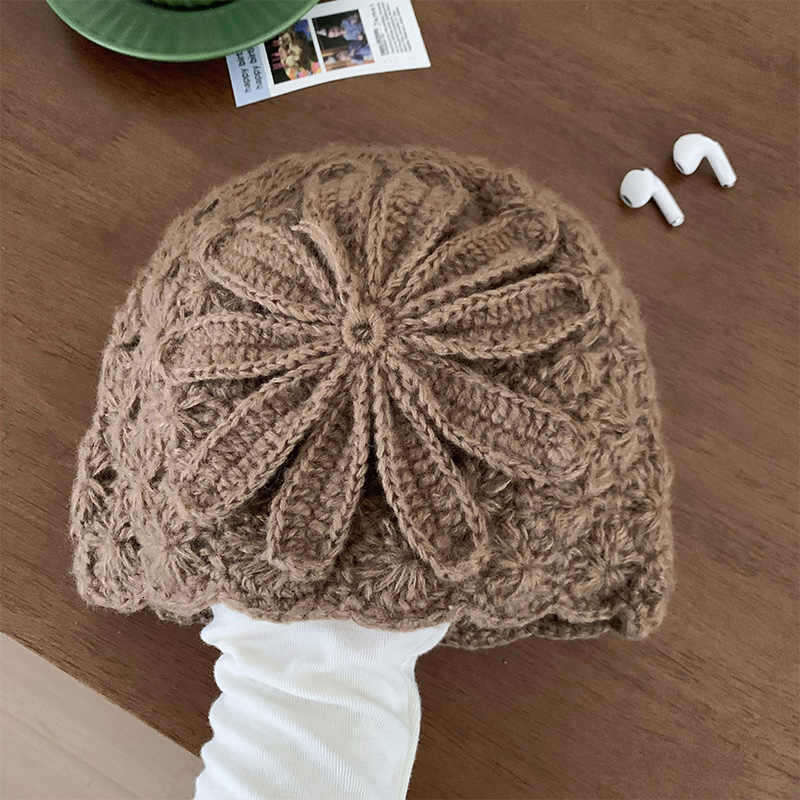 Small niche design handmade crochet yarn for women in spring and autumn, double-layer ear protection pile hat, rural air-cooled hat