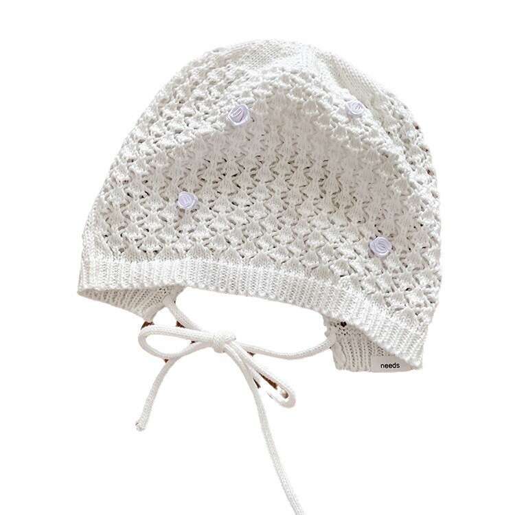 Korean niche design rose hollow knitted hat spring and summer, thin toe for face recognition, small pile cap