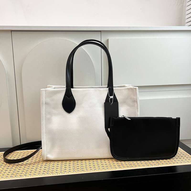 Wholesale new high-quality shoulder bags, large capacity commuting tote bags, versatile hand-held women's bags