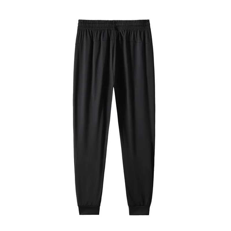Mens ice silk pants summer thin quick drying breathable sports pants loose size straight leg elastic fashionable casual pants W250318