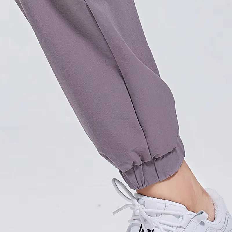 Womens sports pants loose spring and autumn running yoga track suit Trouser pocket fitness solid high waist cargo jogging pants W250318