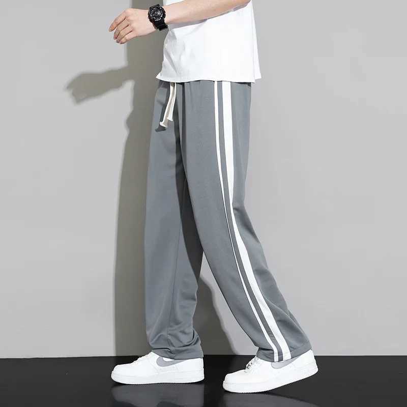 Summer new mens sports pants jogging pants straight pants neutral breathable loose outdoor fast drying fabric striped casual Trouser W250318