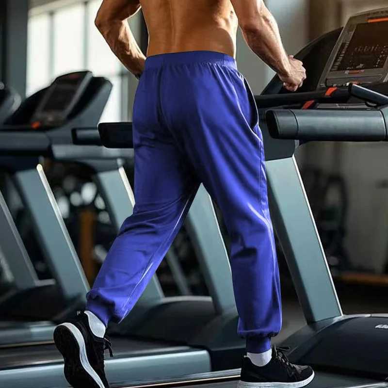 American mens four season tight sports pants classic sports casual pants training and fitness pants W250318