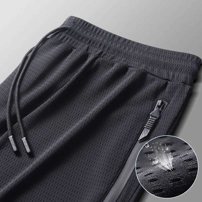 Mens sportswear summer cool fast drying breathable knitted sports pants brushed thin boy Trouser tactical clothing 2025 Z W250318