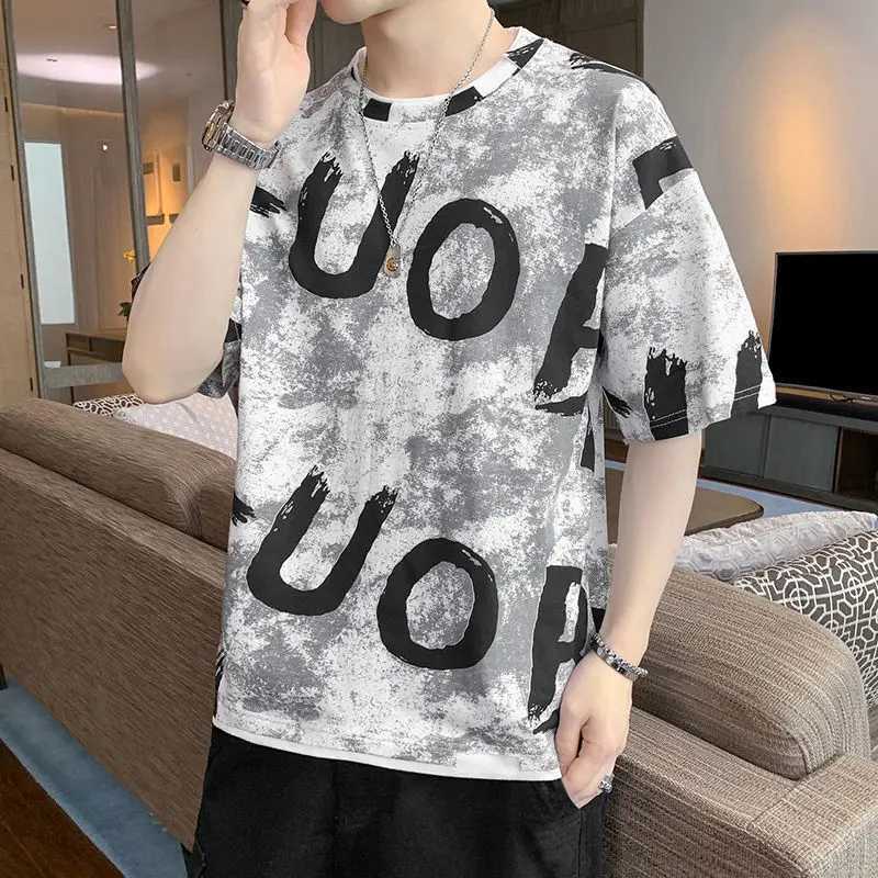 Fashionable O-neck printed patchwork fake two-piece T-shirt for mens 2024 spring new casual floral loose Korean T-shirtT250318