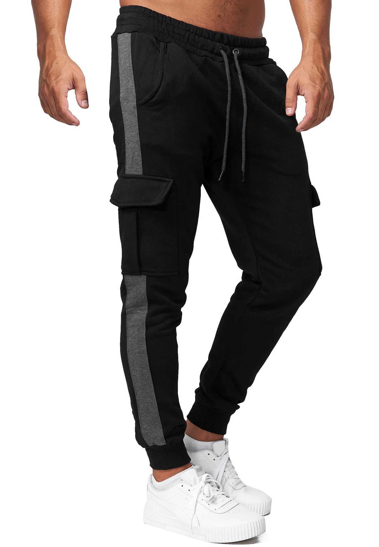 New winter sportswear mens plush sports pants Lambswool hot pants casual pants windproof and warm cotton pants W250318