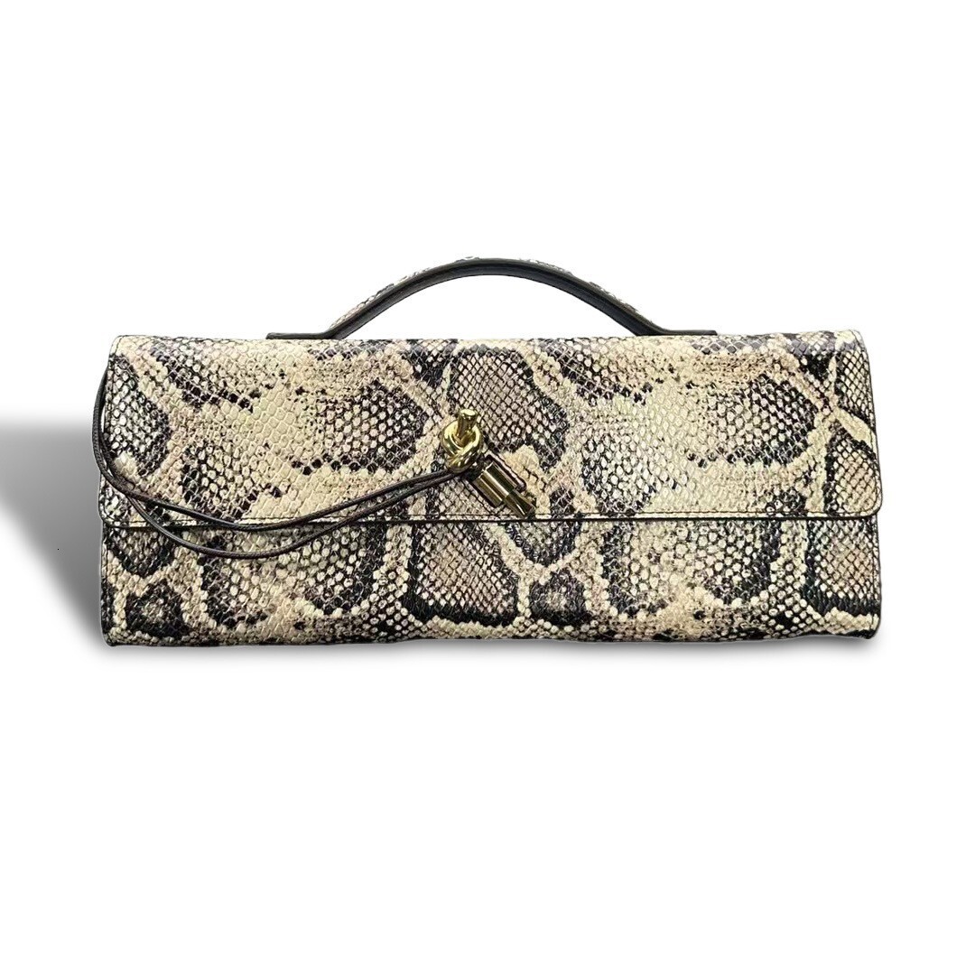 Hot Selling Snake Skin Pattern Handmade Woven Bag Fashionable Designer Women s Handbag High end Niche Dinner Party Baguette Single Shoulder Women Wall
