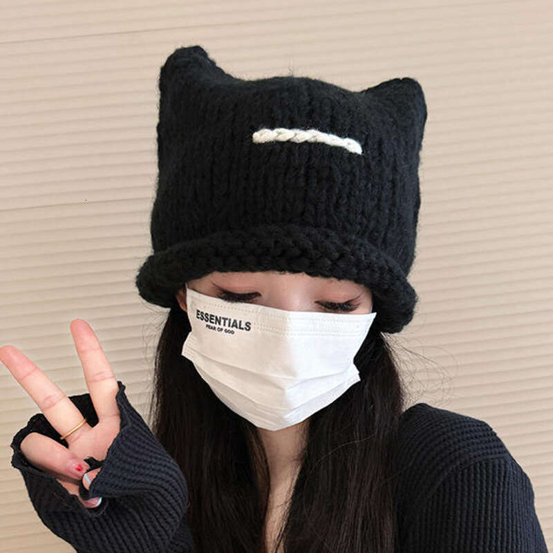 Korean version of new cute cat ear knitted wool for children's autumn and winter fashion, thickened warm hood, cold hat