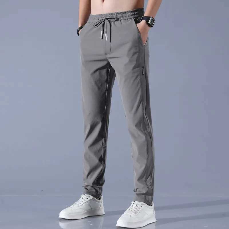 2025 Ice Silk Mens Pants Summer New Black Gray Thin Business Casual Pants Outdoor Elastic Breathable Straight Leg Sweatpants W250318
