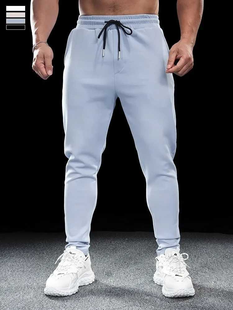 Mens sports fitness leisure slim fit elastic running pants top mens quick drying breathable training pants autumn and winter W250318