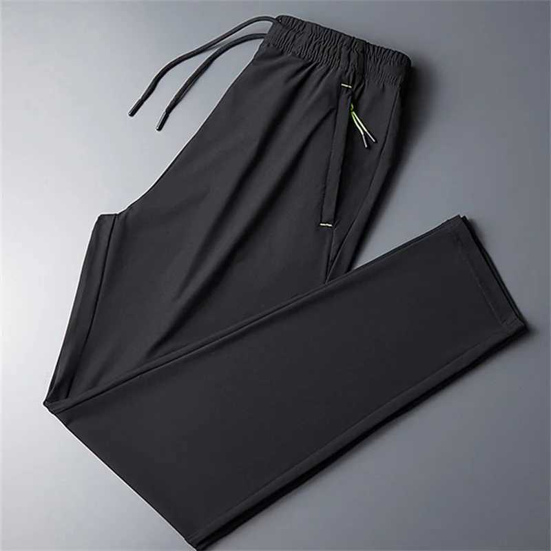 Plus Size 8XL 7XL 6XL Mens Sports Pants Quick Drying Mens Trouser Jogger Sports Clothes Solid Sports Pants Mens Elastic Sports Pants W250318