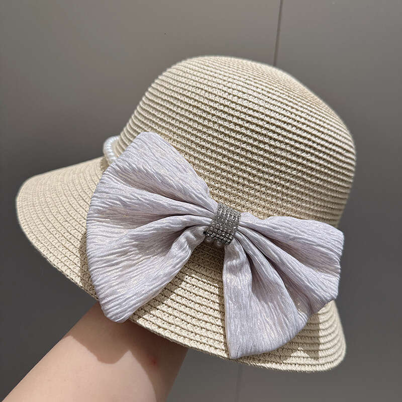 Hepburn style oversized bow water dia fisherman fashionable sun protection and sunshade straw hat, small with eaves pot cap, women's hat