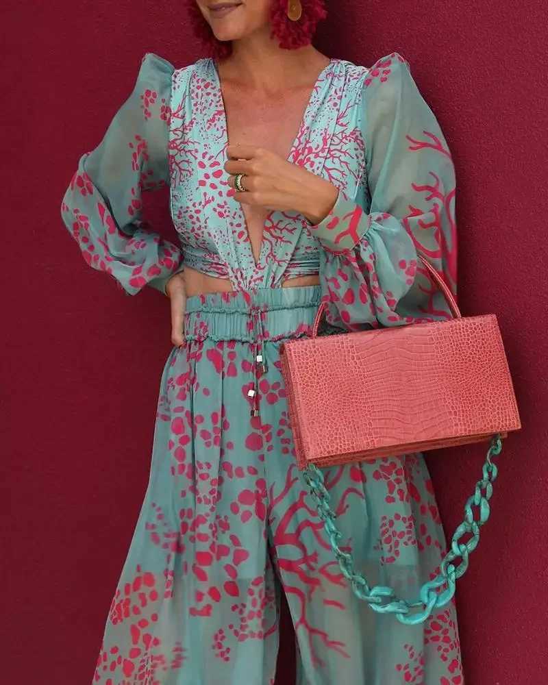 2025 sexy V-neck jumpsuit summer long slip loose Playsuit full set womens elegant printed pocket jumpsuit wide leg pants X250318